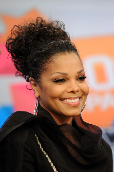 loose bun hairstyles. Janet Jackson Loose Bun