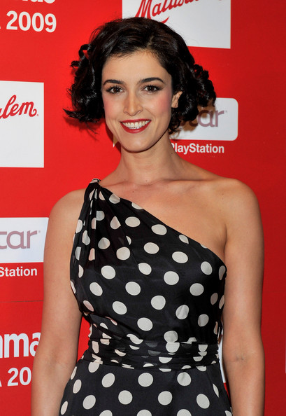 short curly hairstyles with bangs. Blanca Romero Short Curly