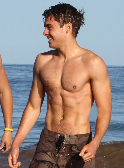 zac efron 2010 shirtless. Zac Efron Swiming at Beach