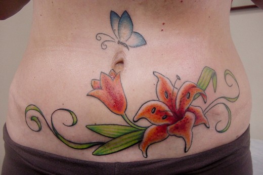 flower tattoo designs and meanings. Cool Lily Flower Tattoo Design