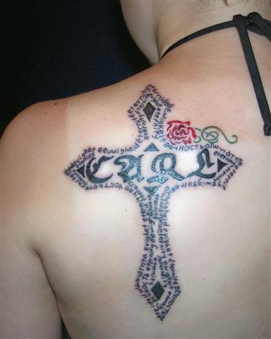 Cross Tattoo on Shoulder