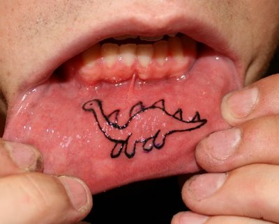 inner lip tattoo. Dino Lip Tattoo