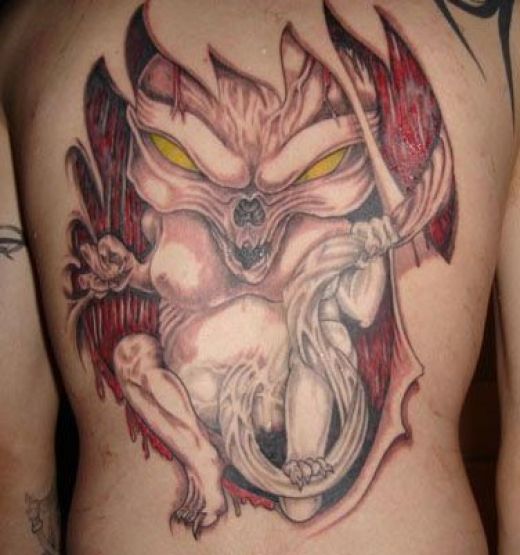 hand tattoo designs. Evil Alien Tattoo Design