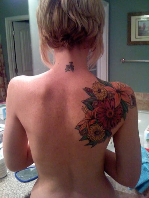 flowers tattoos on back. makeup Hawaiian flower tattoos