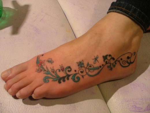tattoos designs for women on the foot. Foot Tattoo Design 2011. Foot Tattoo for Women