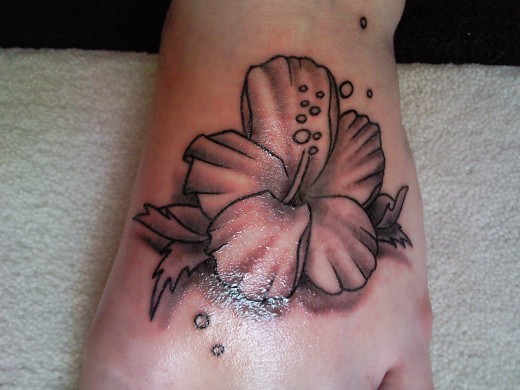 hibiscus flower tattoos on foot. Hibiscus Tattoo for Feet. Hibiscus Tattoo for Neck