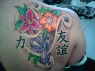 japanese girl tattoo. Japanese Flower and Kanji