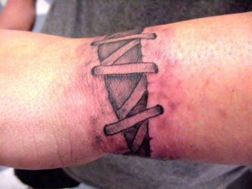 wrist band tattoo. Barbed Wire Tattoo Designs
