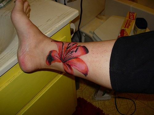 lily tattoo designs. Lily Flower Tattoo for Leg