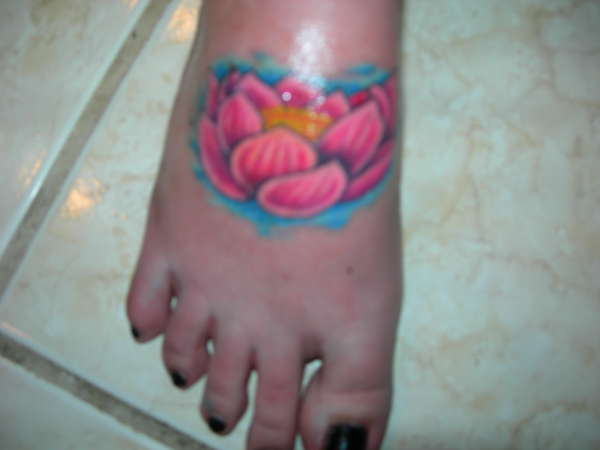 Tattoos On The Foot. hot Flower Foot Tattoo 3