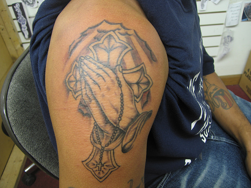 prayer hands tattoo. Praying Hands Tattoo for