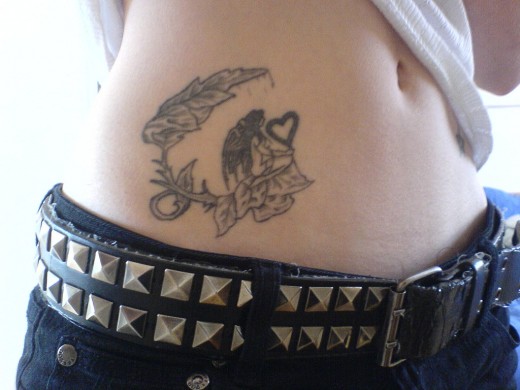 stomach tattoo designs. Stomach Tattoo Design 2011