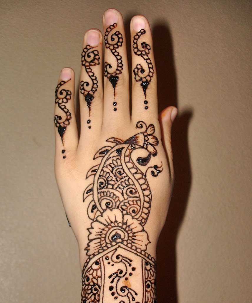 http://www.yusrablog.com/wp-content/uploads/2011/01/Awesome-Back-Hand-Mehndi-Design-for-2011.jpg