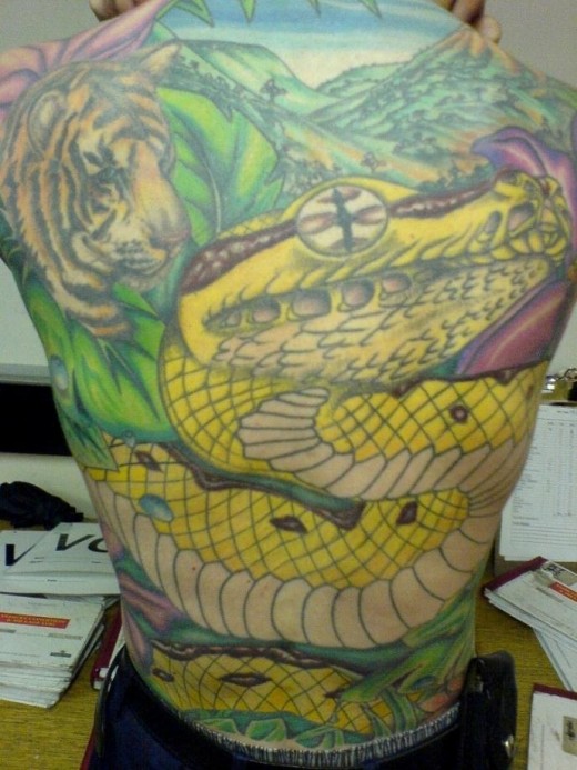 tattoos designs for men on back. Colorful Reptile Tattoo Design