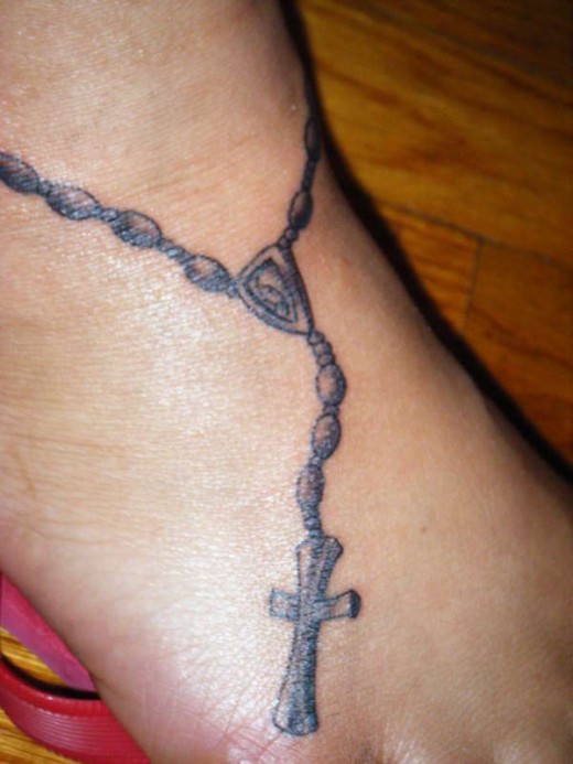 cross tattoos designs for girls. Elegant Rosary Cross Tattoo
