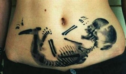 stomach tattoo designs. Lower Stomach Tattoo Design
