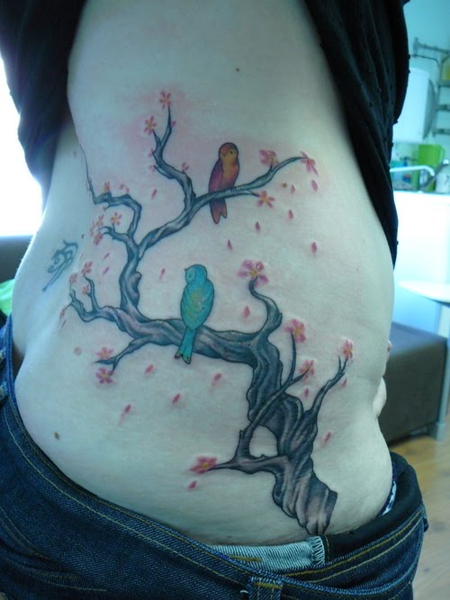 rib tattoo ideas. Tree Tattoo Design on Rib for