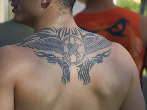 tribal tattoos designs on back. Upper Back Tribal Tattoo Design for Men