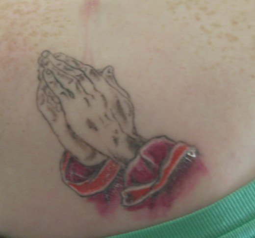 praying hands tattoos. Praying Hands Tattoo Designs