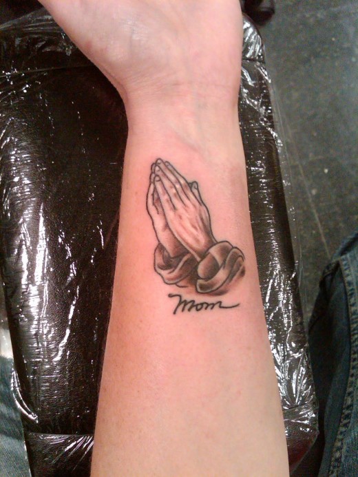 tattoos designs for girls on arm. Girls Praying Hands Tattoo Design on Arm 2011