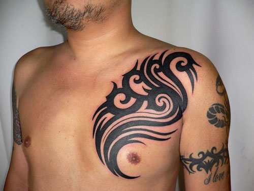 tribal tattoos for women on shoulder. Guys Shoulder Tribal Tattoo
