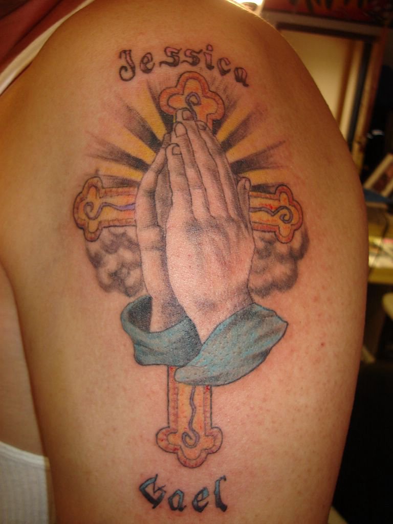 praying hands tattoo