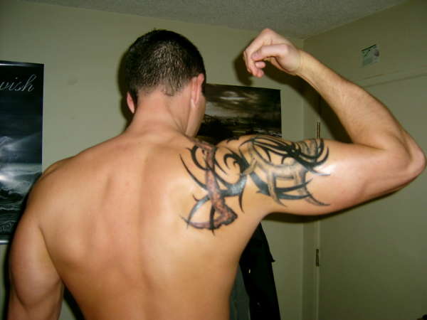 tribal tattoo designs for men shoulder. You are here: Home » Outstanding Tribal Shoulder Tattoo for Men 2011