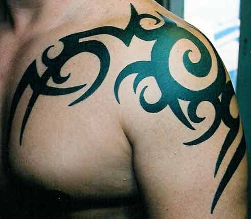shoulder tattoos tribal designs. Younger Boy Tribal Shoulder Tattoo Design 2011