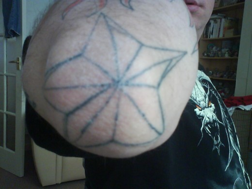 star tattoos for men on elbow. Younger Guys Elbow Tattoo Design for 2011