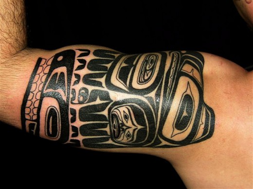 tribal tattoos for men shoulder and arm. Younger Guys Tribal Arm Tattoo