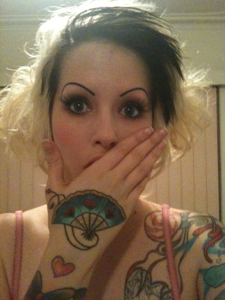 Elegant Tattoo on Hand for