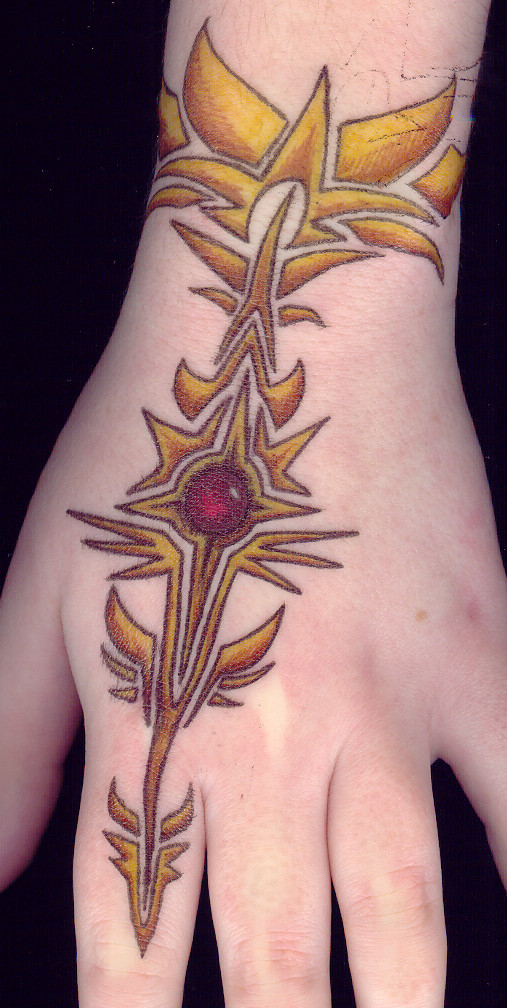 Gold Star Hand Tattoo Latest Style for 2011