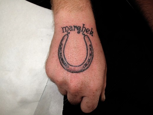 tattoos on hand for men. Latest Horseshoe Tattoo on Hand for Men 2011