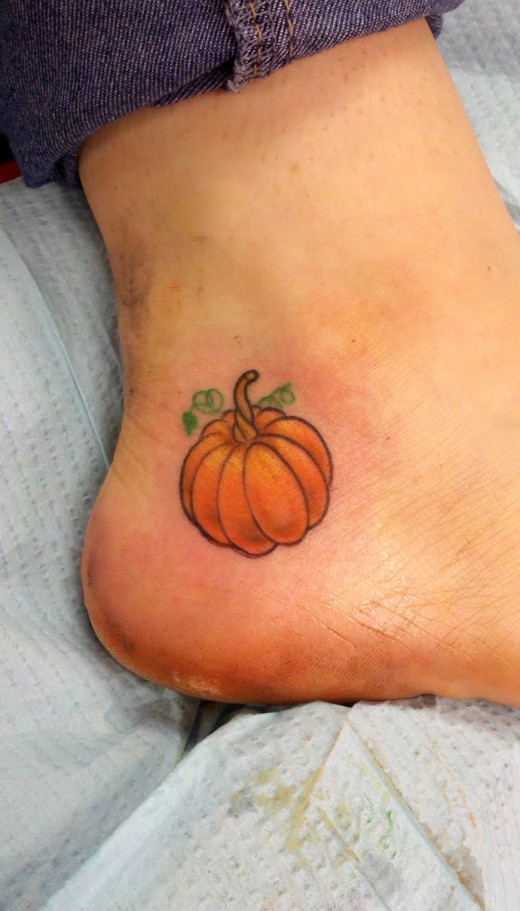 Pumpkin Tattoo Design on Foot for College Girls