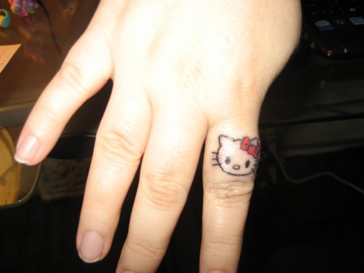 Small Tattoo Design on Hand for Women 2011