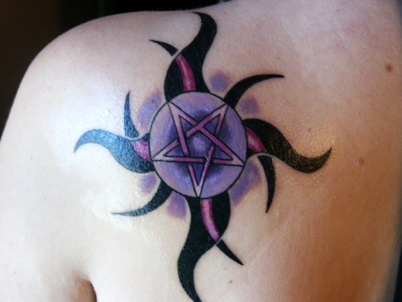 2011 Sun Tattoo Designs For Girls